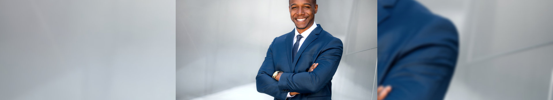 Portrait of male african american professional, possibly business executive corporate CEO, finance, attorney, lawyer, sales, stylish modern black american businessman, handsome smiling portrait next to financial building